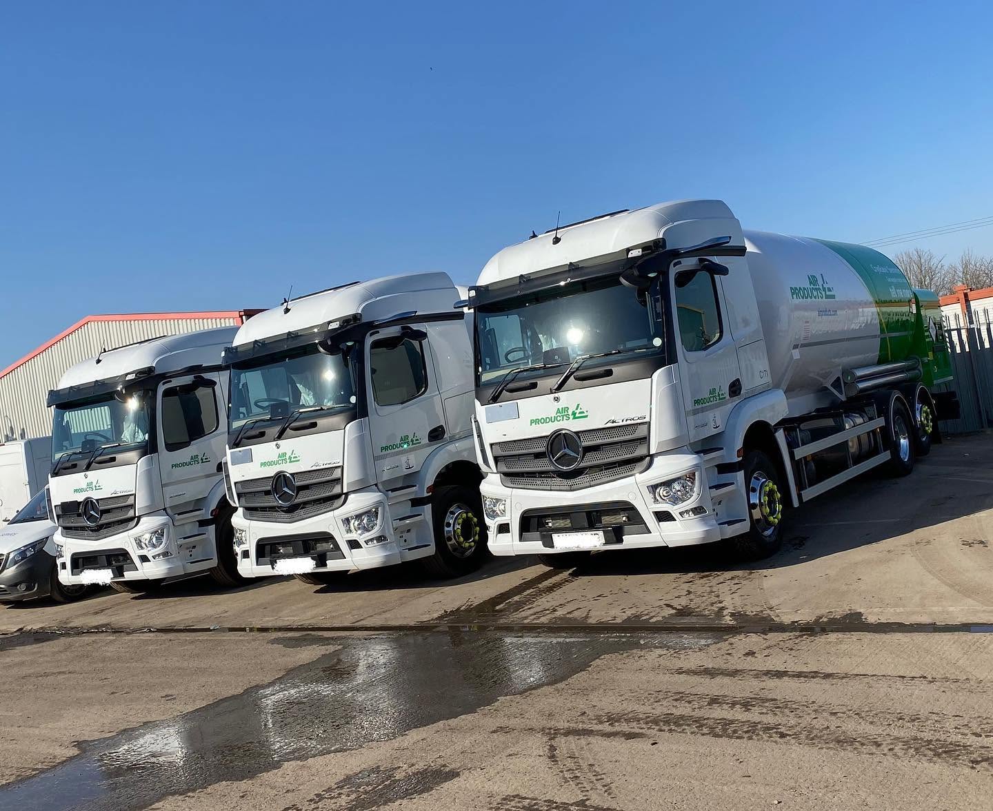 Line of clean tanker trucks prepared on a commercial site